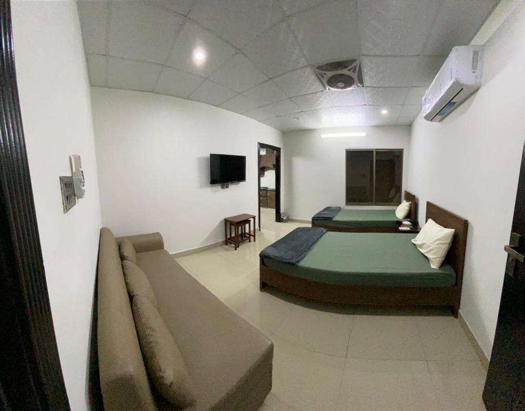 • Faizi Furnished Apartments Faisalabad Exterior photo